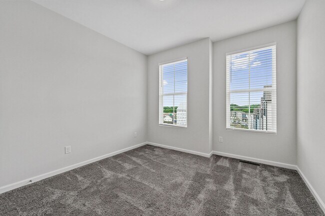 Building Photo - BRAND NEW Townhome located in Westside Ben...