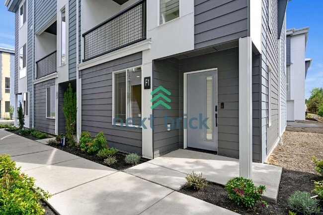 Building Photo - Brand-New 2026 Townhome | 3 Bed | 2.5 Bath | 1,560 Sq Ft | EV Garage | A/C Included