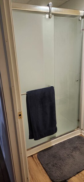 View of shower with doors closed - 2116 Thaler Ave