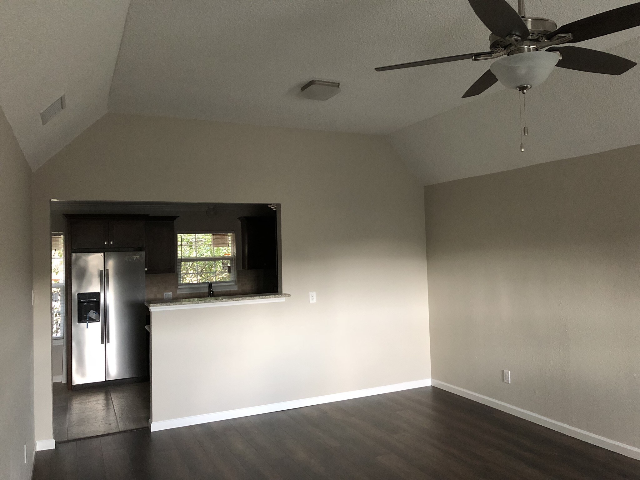 Living looking into kitchen - 3705 W Pioneer Pkwy