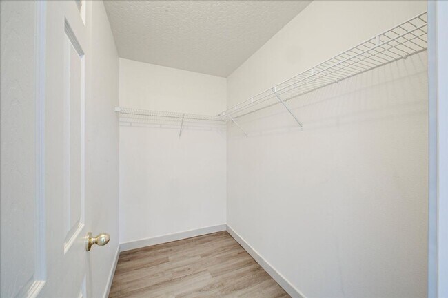 Building Photo - Low-Maintenance Comfort with Community Perks