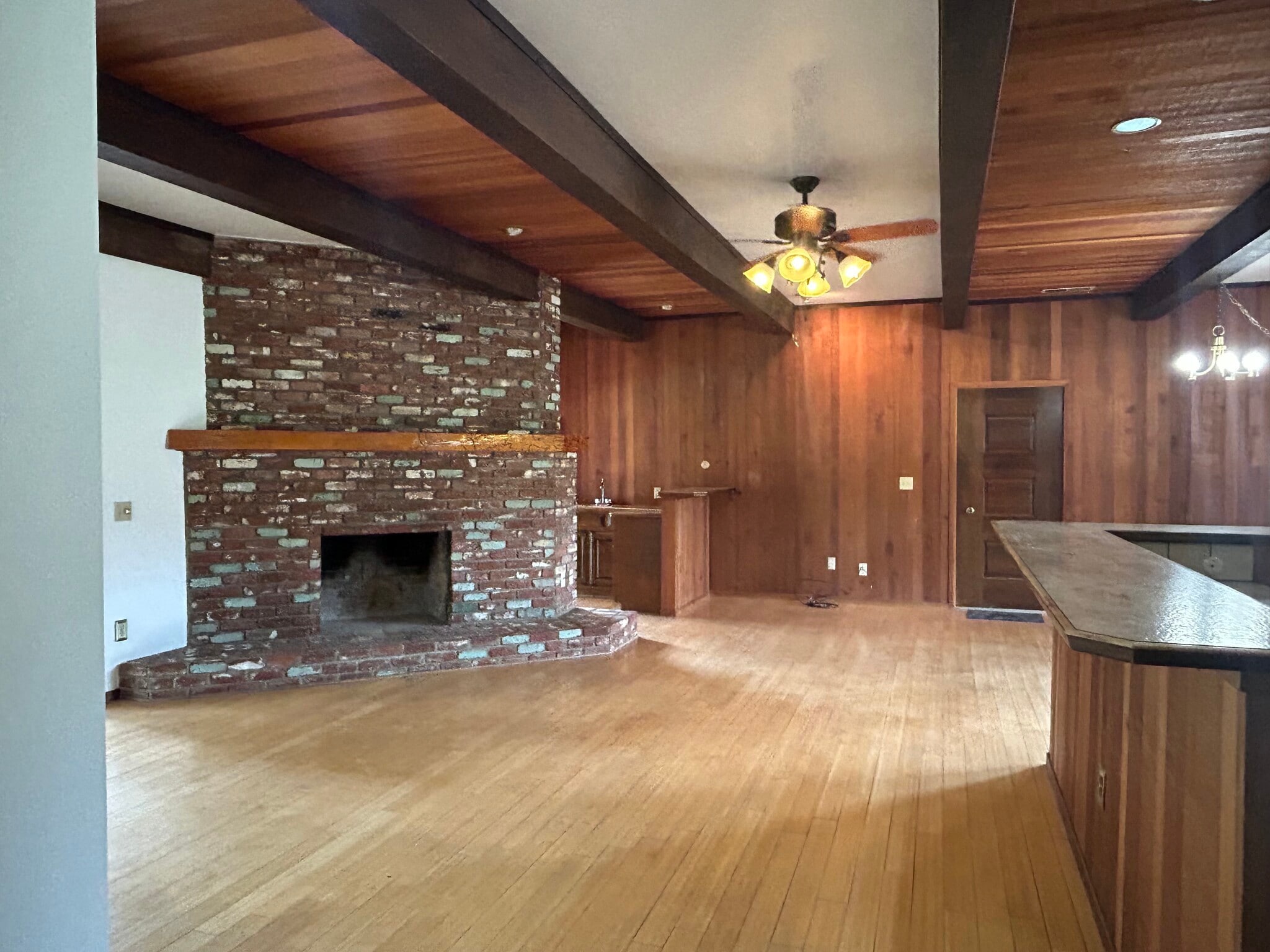 Family room with bar area, exit to garage - 16280 Cattle Dr