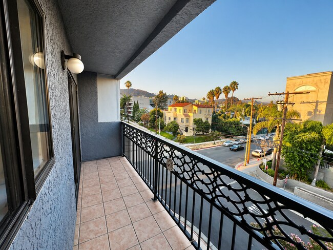 Building Photo - West Hollywood 1-Bedroom with Private Balcony, Rooftop Pool & City Views