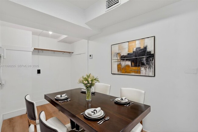 Building Photo - 10240 Collins Ave