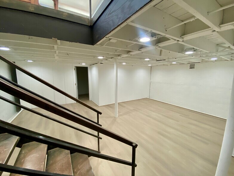 steel stair to large open space - 1734 W Cortland St