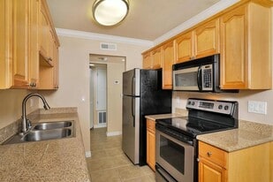 Building Photo - Legacy Condominium Apartments
