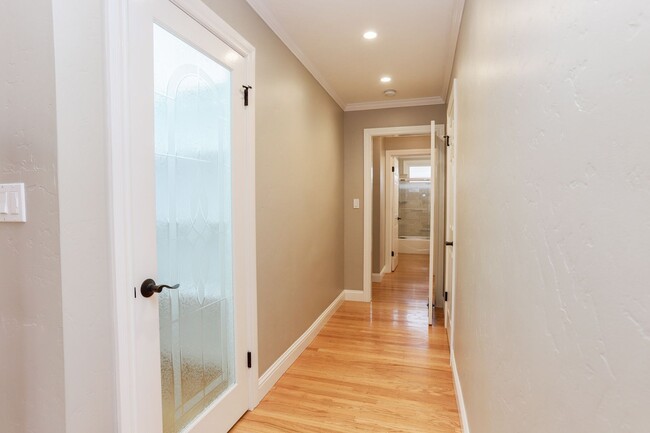 Building Photo - 4BR/3.5BA Belmont Home with Multiple Ensuite Bedrooms, A/C & 2-Car Garage | YouTube Tour