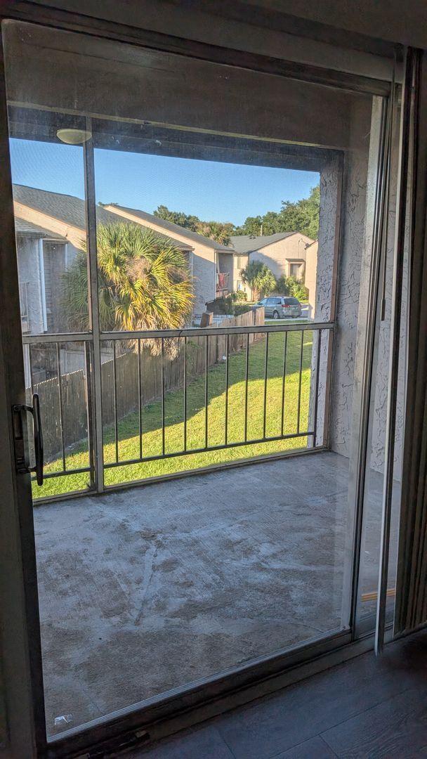 Building Photo - Two Bedrooms with terrace and fenced patio. Move in Special: Move before February 28th. for a sec...