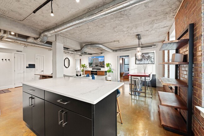 Building Photo - Fully Furnished Designer Loft with Parking & Monument Views!