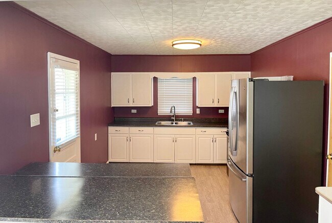 Building Photo - East Side Gem – Spacious 2BR Home with 2 C...