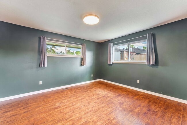 Building Photo - Charming 4-Bedroom Home with Spacious Yard in Rogers