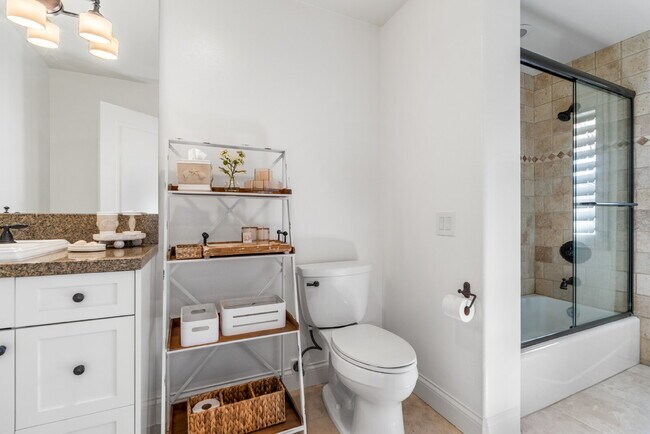 Building Photo - "Coastal Tommy Bahama at 208 East Balboa: Fully Furnished 3-Bed Sanctuary with Rooftop Deck