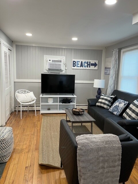 Living room with new smart tv, wifi and cable included - 266 Cosey Beach Ave