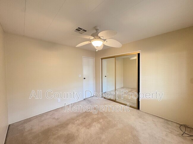 Building Photo - 38251 Desert Greens Dr E