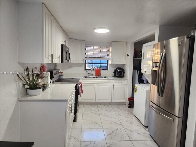 Building Photo - 5100 W 12th Ln