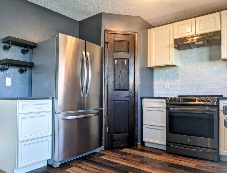 Kitchen with smart oven and glass tile back spalsh - 2114 Laforest Ave