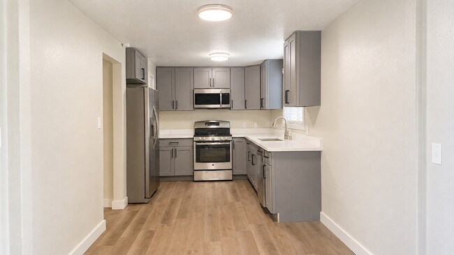 Building Photo - Renovated 3-Bedroom Home with Fenced Yard, Fireplace & In-Unit Laundry