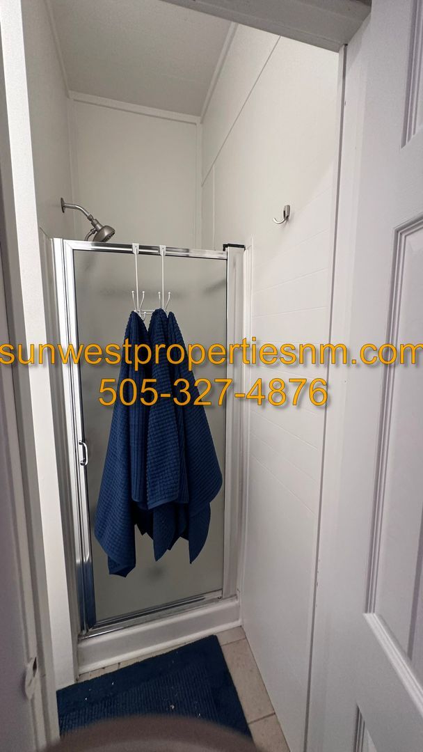 Building Photo - Fully Furnished Studio Apartment