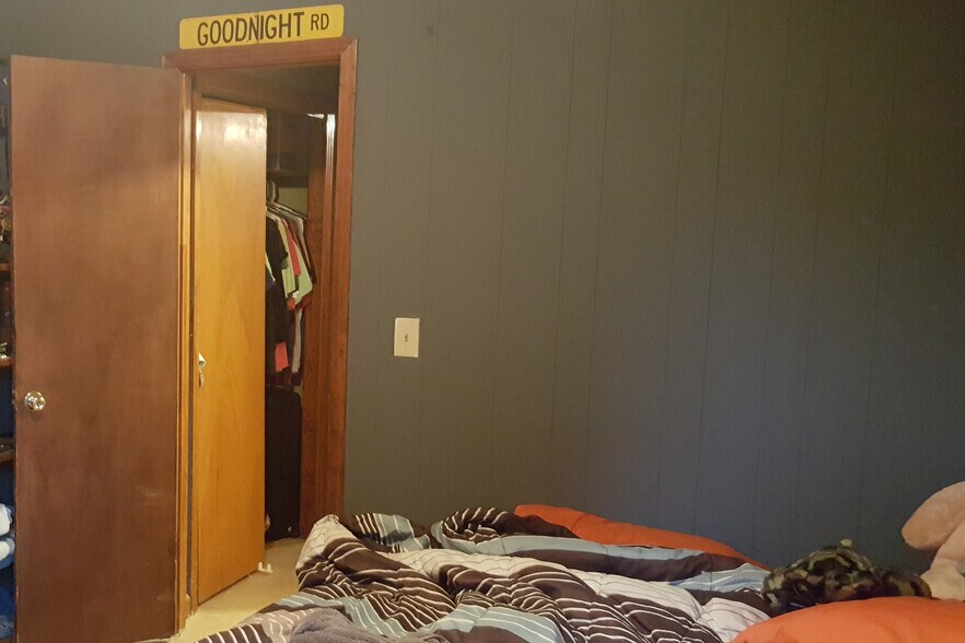 Bedroom with exit to back yard. - 1109 North Yale Street