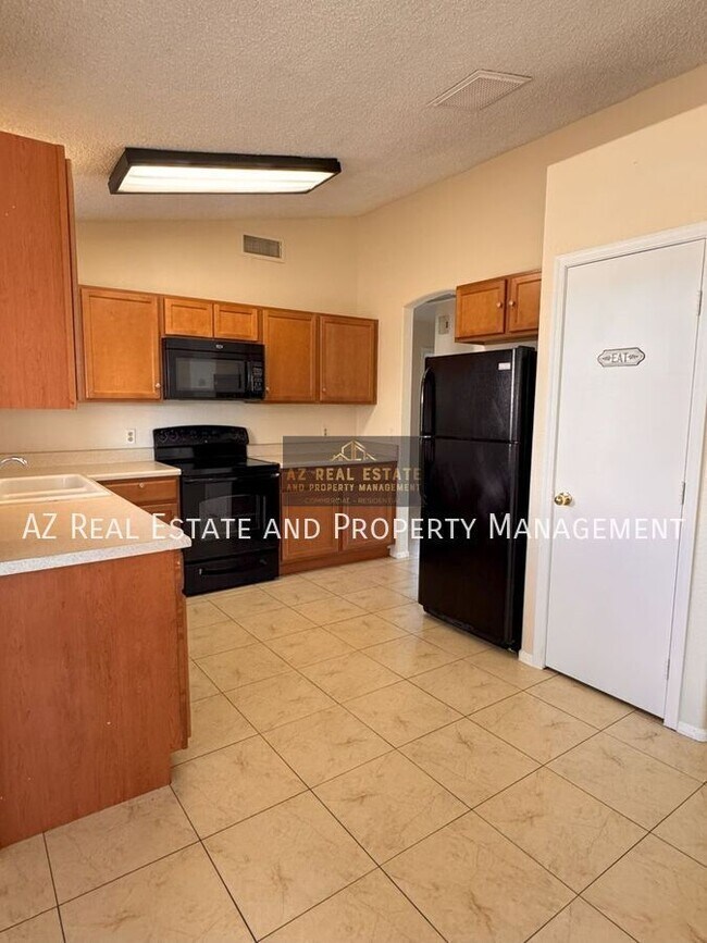 Building Photo - 8528 W Pershing Ave