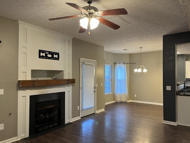 Building Photo - "Spacious 3-Bedroom Townhouse Retreat with Fireplace & Hardwood Floors in Antioch!"