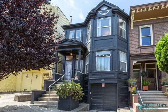Building Photo - Castro: UNFURNISHED Top Floor Flat w/ Private Deck, W/D in unit & Garage Parking