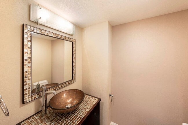 Building Photo - Fully renovated 2 bedroom 2 car garage Townhome