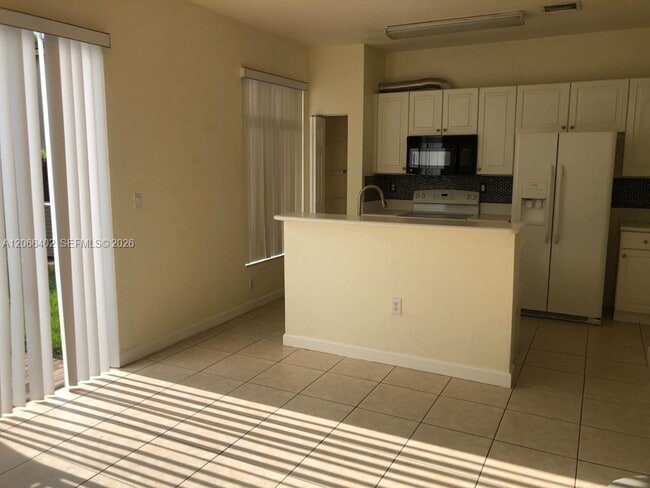 Building Photo - 5598 NW 113th Ave