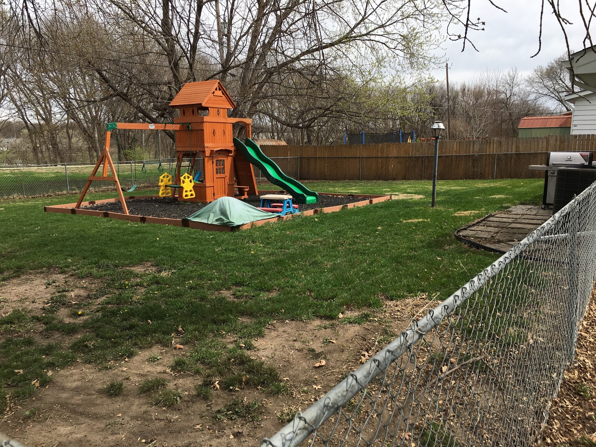 Backyard (Play Structure will be gone in June but 20'X20' border with black rubber mulch will remain.) - 5810 Wilshire Boulevard