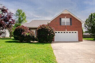 Building Photo - Three Bedroom with Bonus and Pool!