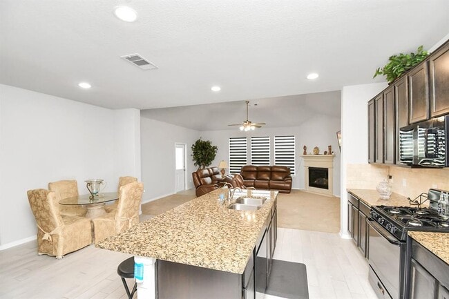 Building Photo - 8802 Mallow Rose Wy