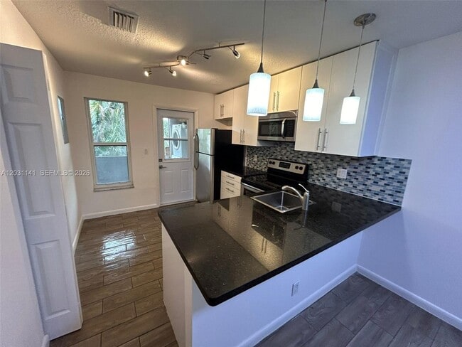 Building Photo - 3777 NW 78th Ave