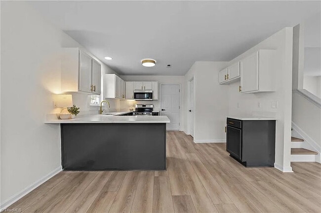 Building Photo - Earn Wealth While Leasing - Like a Homeown...