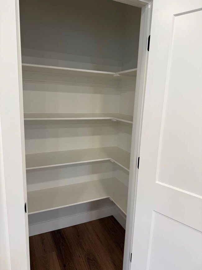 Building Photo - Half off first months rent - Beautiful townhome with 2 car garage, Central Air and Master Suite