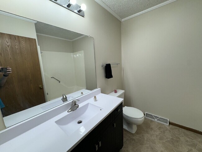 Building Photo - Love Grows — Spacious 2-Story Townhome