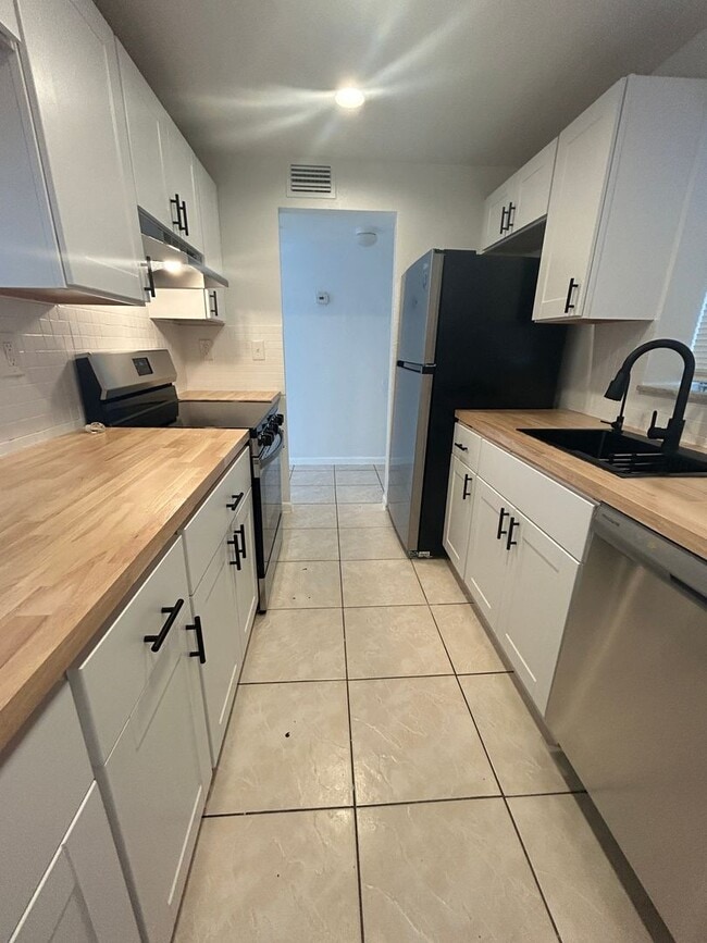 Building Photo - Now Leasing - Two bedroom condo with a pri...