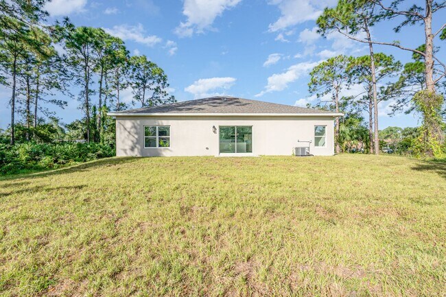 Building Photo - BRAND NEW! 4/2 PALM BAY!