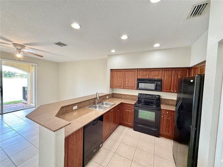 Building Photo - 8380 SW 25th Ct