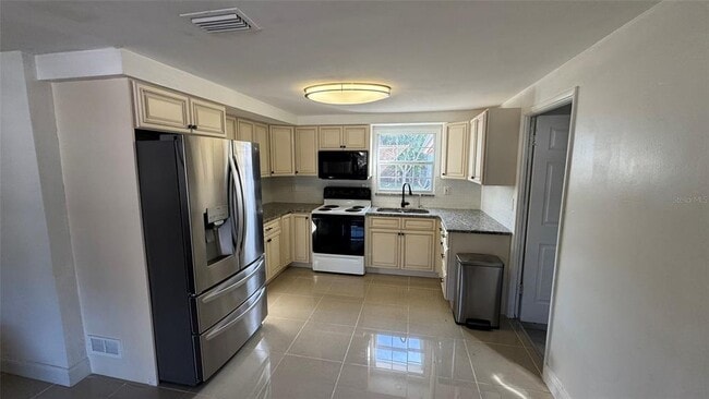 Building Photo - 6980 82nd Ave N