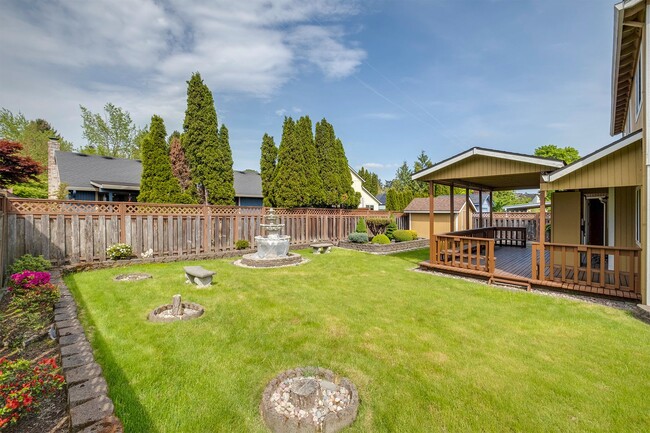 Building Photo - Spacious 5-Bedroom Home with Beautiful Bac...