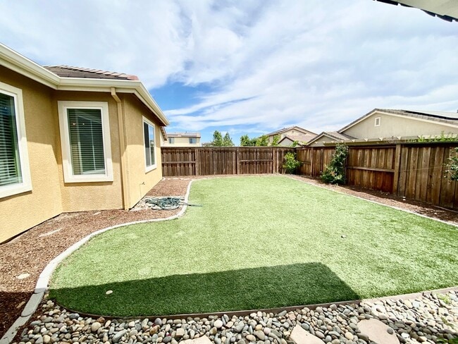 Building Photo - ALMOST NEW, UNIQUE 4 BEDROOM, 3 BATH, 2 CA...
