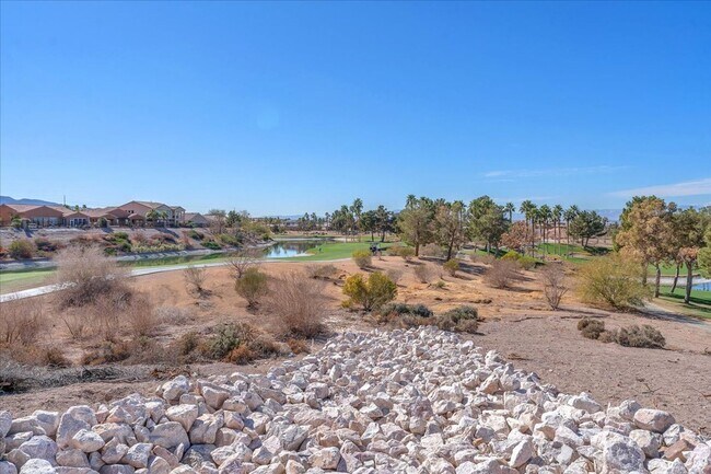 Building Photo - 4-Bedroom Tuscany Townhome with Strip & Golf Course Views