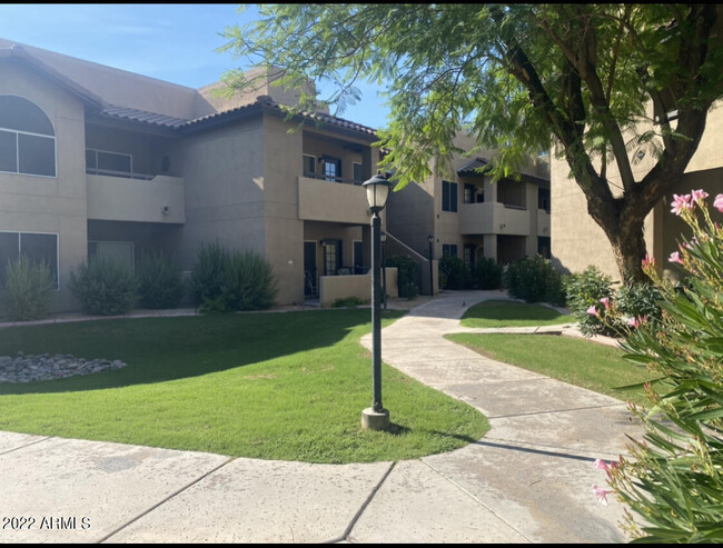 Building Photo - 9451 E Becker Ln