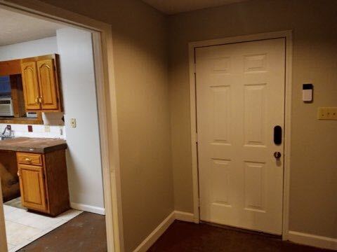 Front door entrance with Simplisafe alarm system - 140 Lemmon Drive
