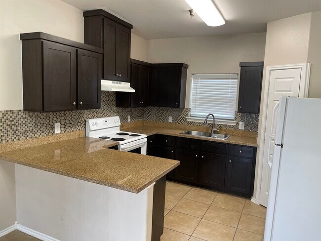 Building Photo - 5402 Marcella Ave