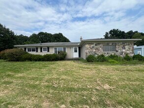 Building Photo - 8936 Huron River Dr
