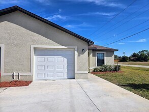 Building Photo - Move in Special + Pets Allowed