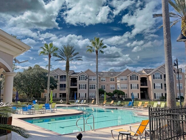 Building Photo - Great 2 Bedroom, 2 Bathroom Second Floor Unit Located inside a Gated Community with a One Car Gar...