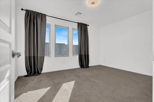 Building Photo - Stunning 4-Bedroom Home in Gated Community Near I-215 & Top Amenities!