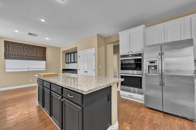 Building Photo - A Fabulous 4 Bedroom Home with a Sparkling Pool!!!